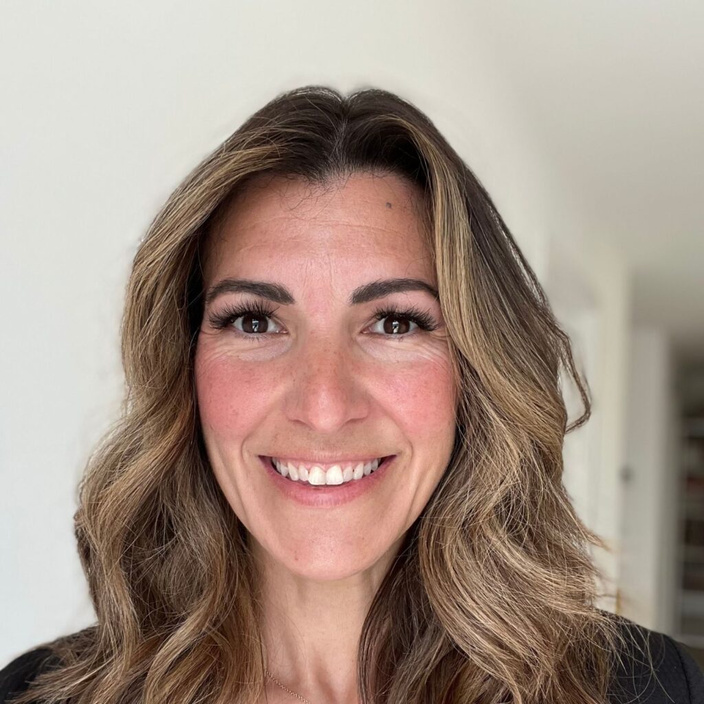 Headshot of a brunette woman